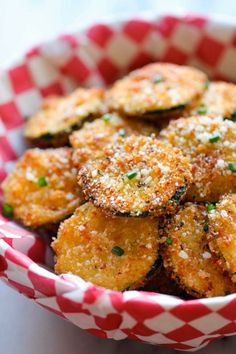 some fried food in a red and white bowl