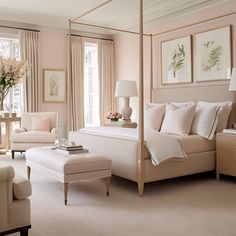 a bedroom decorated in pink and white with four poster bed, chair, ottoman, lamps, pictures on the wall