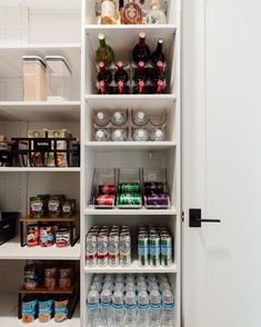 an organized pantry with lots of food and drinks