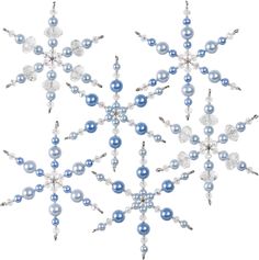 a snowflake made out of blue and white beads on a white background with clippings