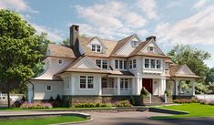 a large white house sitting on top of a lush green field