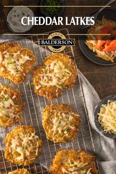 cheddar lakes on a cooling rack with shredded cheese and parmesan cheese