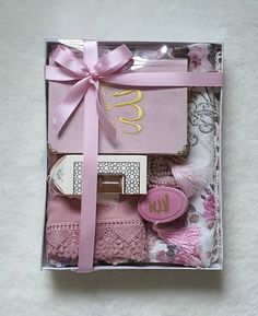 a pink box filled with lots of different items