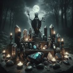 the statue is surrounded by candles and rocks