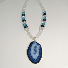 Blue Is A Calming And Reflective Color. The Agate Has A Supportive Energy That Can Symbolize Freedom And Serenity. Blue Agate Helps To Explore Polarities In Your Own Self. The Blue Agate Gemstone Is Said To Have Healing Properties, Making It Not Only A Beautiful Piece Of Jewelry But Also A Meaningful One. The Seller Warranty Provides Peace Of Mind. This Necklace Is Perfect For Beauty And Fashion Enthusiasts, And It Makes A Great Gift For Friends And Family. Blue Agate Stone Necklaces, Blue Faceted Beads Jewelry For Healing, Blue Agate Beaded Necklace With Natural Stones, Blue Agate Beaded Necklaces With Natural Stones, Blue Spiritual Crystal Necklace With Faceted Beads, Blue Agate Stone Necklace, Blue Crystal Necklaces With Faceted Beads For Healing, Blue Beaded Necklaces With Stones For Healing, Spiritual Blue Crystal Gemstone Necklaces