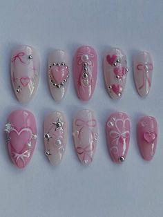 Handmade pink press on nails with hearts and bows🎀Easy application and can be reused multiple times. Cute Pink Nails With Design, Light Pink Chrome Nails With Design, Accessory Nail Art, Pink Nails My Melody, Glitter Pink Nail Designs, Valentine’s Day Nails For Kids, Short Nail Designs Charms, Coquette Nails Pink Bow, Easy Pink Nail Art