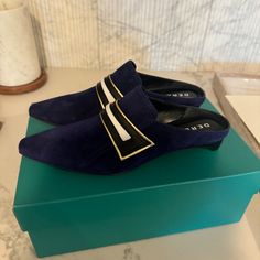 - Derek Lam Blue Suede Mule Loafers - Short Heel; White Leather And Gold Detailing At Top - Suede Upper And Leather Inner - Brand New; Never Worn Before; Comes With Original Box - Made In Italy Blue Elegant Round Toe Slip-ons, Elegant Blue Round Toe Slip-ons, Elegant Blue Slip-ons With Round Toe, Elegant Blue Slip-ons For Work, Blue Loafers For Office In Spring, Blue Loafers For Spring Office Wear, Spring Office Blue Loafers, Blue Flat Heel Slip-ons For Formal Occasions, Blue Slip-on Flats For Office