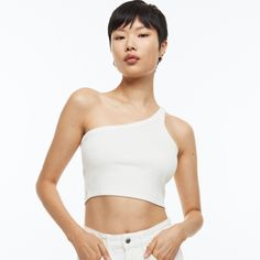 Fitted, One-Shoulder Crop Top In Ribbed Cotton Jersey With One Narrow Shoulder Strap. Perfect For Summer On Its Own Or With A Shirt On Top. Size: Medium Condition: New With Tags Trendy White Off-shoulder Crop Top, White Fitted One-shoulder Tank Top, Fitted White One-shoulder Tank Top, White Stretch One-shoulder Crop Top, White One-shoulder Stretch Tank Top, Fitted White One Shoulder Top, White Fitted One-shoulder Top, H&m White Spring Tank Top, H&m White Tank Top For Spring