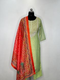 Green & Orange Zari / Embroidered Straight Silk Kurta With Trousers and Dupatta Indian Party Wear Kurta Sets - Maroon Brocade/Zari Silk Kurta With Trousers Dupatta - Silk Kurta Sets - Pakistani Salwar Kameez Set - Tunic Tops The set contains: 1 Kurta 1 Palazzos 1 Dupatta Kurta: The green and orange straight Kurta has a round neck design with embroidered design. The Kurta measures till calf length and has straight hemline. Sleeve length : 3/4 Sleeves Palazzos: Solid trousers  has elasticated wais Festive Semi-stitched Orange Kurta, Semi-stitched Green Cotton Silk Kurta, Semi-stitched Orange Raw Silk Kurta, Red Semi-stitched Silk Kurta, Red Semi-stitched Shantoon Kurta, Indian Party, Indian Party Wear, Pakistani Salwar Kameez, Party Kleidung