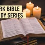 an open book sitting on top of a wooden table next to candles and books with the words mark bible study series