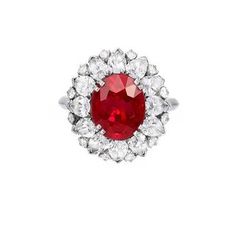 METAL SPECIFICATIONS Metal Name: White Gold 14K STONE SPECIFICATIONS Stone Name: RUBY /DIAMOND Stone Cut : Oval, Round & Pear cut Stone Specifications: There is one ruby in the center of approx. 13.75 carat & approx. 4.00 carats of smaller round diamonds on the side. Natural earth mined stones. Total Stone Weight : approx. 17.75 carats Color : Red/F Clarity : AAA/VS1 RING SPECIFICATIONS Appraised Value : $28288.00 Comes with a FREE APPRAISAL Ring Size : 6.5 (Can ship in any size you want Winter Planner Stickers, Ruby Ring Vintage, Fine Pearl Jewelry, Ruby Ring Gold, Colored Stone Rings, Pear Cut Diamond, Ruby Jewelry, Ruby Diamond, Natural Earth