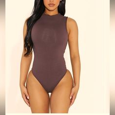 Naked Wardrobe Size Small Chocolate Brown Sleeveless Bodysuit. Cute Mock Neck Detail And Double Snap At Bottom. I Have 2 Size Smalls And They Both Have Some Discoloration Throughout. Some At The Bottom And Some On The Front Middle Area. Sleeveless Brown Bodysuit For Summer, Brown Sleeveless Bodysuit For Summer, Sleeveless Brown Summer Bodysuit, Brown Sleeveless Bodysuit, Wardrobe Brown, Naked Wardrobe, Sleeveless Bodysuit, Chocolate Brown, Mock Neck