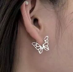 100% High quality Sterling Silver Butterfly Earrings Set.  This earrings features a delicate and intricate butterfly design, crafted from high-quality sterling silver plated gold.  Butterfly earrings also make a great gift for birthdays, holidays, or other special occasions, and are sure to be cherished by anyone who receives them. PRODUCT DETAILS Hoops Size: 2cm wide, 1.5cm long * Material: Sterling Silver * Dimensions: 2cm wide, 1.5cm long Why Our Jewelry? Handcrafted with premium quality long lasting sterling silver.  Hypoallergenic Will not turn green. A special piece you'll treasure. 5-star reviews 🌎Production Time & Shipping🌎 * Because our products are custom made, please allow 2-3 business days for production. This can change during peak seasons. Expedite shipping does not change Silver Butterfly Jewelry For Pierced Ears, Sterling Silver Butterfly Charm Earrings, White Butterfly Shaped Pierced Earrings, White Pierced Butterfly Earrings, Silver Dainty Butterfly Earrings, Dainty Silver Butterfly Earrings, White Butterfly Charm Earrings As Gift, White Butterfly Charm Earrings, White Butterfly-shaped Earrings With Butterfly Charm