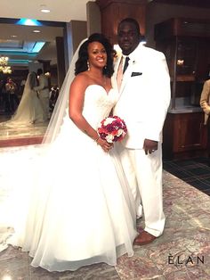 a bride and groom posing for a photo