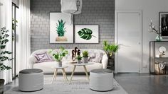 a living room filled with white furniture and potted plants on top of it's tables