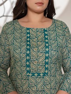 This 3-piece set includes teal green cotton ethnic motif print, beads & stone detailing straight shape kurta has round neck, 3/4th sleeves, straight hem, calf length teamed with printed trouser pants has elasticated waistband & slip on closure with single pocket and a voile dupatta. The model wearing the size small is 5'8 in height. 3 Piece Set Color-Teal Green Kurta Fabric- Cotton Bottom Fabric - Cotton Dupatta Fabric-Voile Work - Ethnic Motif Print, Beads & Stone detailing Neck - Round Neck Sl Unstitched Green Kurta With Traditional Patterns, Bohemian Green Kurta With Kalamkari Print, Transitional Green Cotton Traditional Wear, Green Traditional Wear With Kalamkari Print For Transitional Season, Green Cotton Kurta For Transitional Season, Transitional Green Traditional Wear With Kalamkari Print, Bohemian Green Palazzo Set For Diwali, Green Motifs Kurta For Transitional Season, Green Block Print Salwar Kameez For Diwali