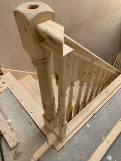 a wooden stair case being built in a house