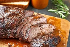 some meat is sitting on a cutting board