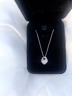 "This handmade breastmilk necklace is a truly unique and special piece of jewelry. Made with your own breastmilk, ( or formula), it is a beautiful reminder of the incredible bond between a mother and her child. The breastmilk is carefully preserved and encapsulated in resin, creating a stunning focal point for the ring. The setting is made of high-quality, durable materials, ensuring that this ring will last for years to come. Whether worn for special occasions or as an everyday accessory, this breastmilk ring is sure to become a treasured keepsake. Each one is custom-made to order, making it a truly personalized and meaningful gift for any mother. Please allow up to a month to receive your item as I order the ring AFTER you order and make it once it arrives to me. ❤️ If you take a few wee White Heart Necklace With Clavicle Chain As Gift, Hypoallergenic White Gold Round Pendant Necklace, White Heart Clavicle Chain Necklace As Gift, Hypoallergenic Sterling Silver Necklaces For Anniversary, Sterling Silver Birthstone Necklace For Keepsake, Elegant Small Silver Necklace, Anniversary Hypoallergenic Round Pendant Necklace, Hypoallergenic Round Pendant Necklace For Anniversary, Elegant Hypoallergenic Charm Necklace Gift