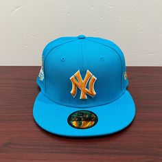 Brand - New Era Hat Model - 59fifty Hat Type - Fitted Team - New York Yankees Color - Blue & Orange Condition- Brand New Sizes Available; 7 1/8, 7 5/8 Blue Flat Crown Hat For Streetwear, Blue Baseball Cap With Flat Brim For Fan Gear, Sports Blue Snapback Hat With Flat Crown, Blue Snapback Hat With Flat Crown For Sports, Blue Snapback Hat For Sports Events, Blue Fitted Hat For Baseball Season, Blue Flat Crown Snapback Hat For Sports Events, Blue Flat Brim Baseball Cap For Fan Gear, Blue Flat Bill Hat For Streetwear