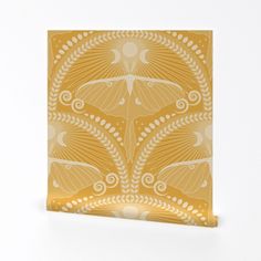 a yellow and white pattern on a card