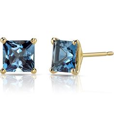 Our midnight muse You'll immediately fall in love with this mystical, midnight London Blue Topaz. These classic earrings feature princess shape Peora natural london blue topaz gemstones in 14K yellow gold. Our natural London Blue Topaz gemstones are a unique gift from nature. By cutting them in a way that respects the rough's natural radiance, we ignite their inherent intensity and maximize their brilliance to deliver on our signature Peora standard. Handcrafted in pure 14K yellow gold goodness, these earrings have been carefully coated in an elegant rhodium finish. Our artisans are expertly trained in this process which fortifies the earring's strength, shine and brilliance. Looking for a special jewelry gift for someone special? Our concierge stylists are here to help with all of your je Princess Cut Stud Earrings, Princess Cut Gold, Blue Topaz Earrings, Classic Earrings, Topaz Earrings, Swiss Blue Topaz, Yellow Gold Earring, London Blue Topaz, London Blue