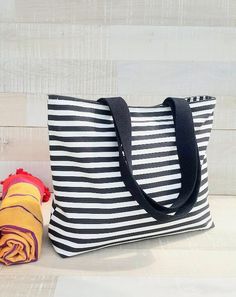 Striped Beach Bag For Everyday Summer Use, Summer Beach Bag With Striped Lining, Summer Travel Shoulder Bag With Striped Lining, Striped Tote Beach Bag, Striped Tote Beach Bag For Everyday, Everyday Striped Tote Beach Bag, Summer Tote Shoulder Bag With Striped Lining, Black Travel Bag With Striped Lining, Summer Striped Shoulder Bag For Everyday