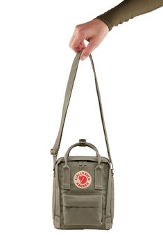 This scaled-tiny version of the classic Kånken backpack offers the same durable construction and rugged utility as the original. A water-repellent finish, plenty of organizational pockets and a shoulder strap add to the everyday versatility of the practical style. Style Name:Fjällräven Kånken Sling Shoulder Bag. Style Number: 5891235. Fjallraven Kanken Sling Bag, Fjallraven Kanken Sling, Kanken Sling Bag, Kanken Sling, Fjällräven Kånken, Classic Backpack, Small Shoulder Bag, Everyday Carry, Kanken Backpack