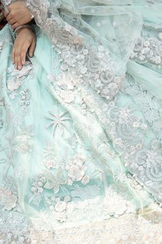 Luxury Embellished Ice Blue Pishwas Frock Pakistani Wedding Dress is a Hand embellishment of kora, Dabka Pearls, and Naqshi masterpiece that will give you your desired magical look on the big day. Perfectly stitched and premium quality fabric make this Pishwas Dress your foremost priority for the wedding. Embroidered Pishwas: The stunning Pishwas Frock Party Dress has a premium Silk fabric. This Pishwas is crafted with Sitara, Dabka, kora, pearls, and Naqshi details all over the kameez that crea Embellished Anarkali Dress For Ceremony, Light Blue Embroidered Dress For Reception, Light Blue Semi-stitched Dress With Intricate Embroidery, Light Blue Embroidered Dress For Wedding, Semi-stitched Light Blue Dress With Intricate Embroidery, Blue Floral Embroidered Wedding Gown, Blue Floral Embroidery Wedding Gown, Traditional Light Blue Organza Dress, Light Blue Reception Dress With Resham Embroidery