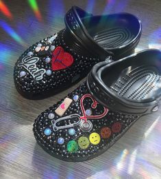 Welcome to Fancy Feet & More! Here you can purchase custom designed crocs and other items using rhinestones, patches, and charms! I am very detailed oriented and I would love to create something special for you! Crocs For Nurses, Custom Nurse Crocs, Black Customized Crocs, Bedazzled Crocs Shoes Black, Nurse Croc Charms, Nursing Crocs, Clogs And Mules, Medical Assistant, Something Special