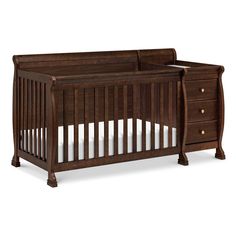 a wooden crib with two drawers on the bottom and one drawer in the middle