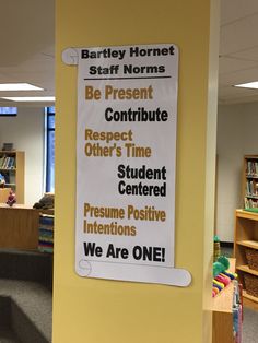 a bulletin board in the middle of a library