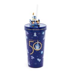 a plastic cup with an image of the castle on top and stars in the sky