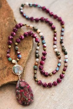 Get ready to boho out with this funky stone necklace! Measuring approximately 34" in length, it features a pendant sized at 1.2"x3".