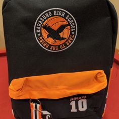 Haikyu "Take To The Skies" #10 Hinata Black And Orange Backpack Polyester Black College Bag For Back To School, Back To School Black College Bag, Black College Backpack, Orange Bags For Back To School, Casual Orange Backpack Bag, Orange Standard Backpack For School, Orange School Backpack, Rectangular Orange Backpack For School, Casual Orange Backpack