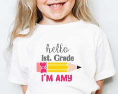 The perfect t-shirt to wear on the 1st day of school and also the rest of the year. Super soft and high-quality shirt. HOW TO ORDER 1. Check the size chart. 2. Choose size. 4. Select the quantity. 5. Click 'Add to Cart.' 6. Repeat all the steps until you have all the shirts you need. 7. Proceed to checkout. Are you wondering what makes our t-shirt so great? - 100% preshrunk cotton - which means won't shrink after the first wash. - It's 4.2 oz. - for that perfect lightweight feel. - It has a retail fit which gives it a fashion-forward feel unisex sizing - great for all gender and all sizes.  We have more Back to School designs available, please check our main webpage:  https://www.etsy.com/shop/MimisAndCo If you have any questions please ask us, we are happy to help. White Funny Text Shirt For School, White T-shirt With Funny Text For School, White Shirt With Funny Text For School, White Shirt With Name Print For School Events, White T-shirt For End Of School Year Events, First Day Of First Grade, Kindergarten Outfit, First Grade Shirt, First Day Of School Shirt