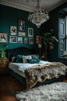 a bedroom with dark green walls and white fur rugs on the floor next to a bed