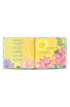 an open children's book with watercolor flowers and the sun in the background