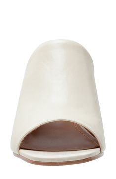 A squared open toe and wrapped block heel frame a versatile mule that will complement your polished wardrobe. 3" heel Cushioned footbed Slip-resistant sole Leather upper/synthetic lining/rubber sole Imported Classic Synthetic Mules In Medium Width, Classic Synthetic Mules Medium Width, White Mules With Reinforced Heel For Spring, Spring White Mules With Reinforced Heel, Leather Slide Heels With Padded Heel, Modern Mules With Wrapped Heel And Round Toe, Synthetic Block Heels With Square Toe And Reinforced Heel, White Open Toe Classic Mules, Modern Open Toe Slides With Stacked Heel