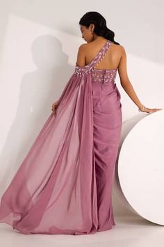 Mauve padded saree gown embellished by crystal and bead floral vine motifs on bodice and pleated waist. Comes with bead-crystal embellished detachable drape. - Aza Fashions Evening Draped Gown With Zari Work, Georgette Gala Dress With Traditional Drape, Floor-length Saree For Gala, Pre-draped Georgette Dress With Zari Work, Pre-draped Embellished Festive Gown, Embellished Draped Wedding Gown, Embellished Saree Dress For Gala, Pre-draped Saree Dress With Zari Work, Evening Draped Dress With Zari Work