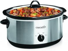 the crock pot is full of meat and vegetables