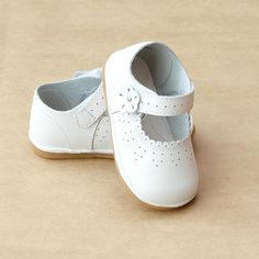 Angel Baby Girls White Scalloped Mary Janes - Petitfoot.com Soft Sole Mary Janes, Soft Sole Closed Toe Mary Janes, White Non-slip Mary Janes With Round Toe, White Leather Mary Janes With Round Toe, White Leather Sole Mary Janes With Closed Toe, Spring Leather Non-slip Mary Janes, White Mary Janes With Soft Sole For Spring, Classic Mary Janes With Soft Sole, Classic Mary Janes With Soft Sole And Closed Toe