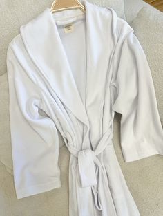 Robes are true to size model is wearing a size M/L White Long Sleeve Winter Robe, Elegant White Lounging Robe, White Long Sleeve Relaxation Robe, White Long Sleeve Robe For Relaxation, White Long Sleeve Home Robe, Fitted Long Sleeve Solid Color Robe, Fitted Long Sleeve Solid Robe, Dream Hotel, Dream Hotels