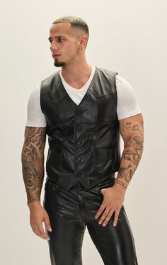 Crafted from premium leather, this vest boasts durability and a luxurious feel. The leather is typically sourced from high-quality hides, ensuring a supple texture and robust performance. The stitching is often reinforced for longevity, emphasizing both style and functionality. Ideal for both casual and semi-formal occasions, the leather vest can be dressed up with a crisp shirt and trousers or dressed down with a T-shirt and jeans. Its timeless appeal makes it suitable for various seasons, offering warmth during cooler months while remaining breathable. SIZE + FITTailored fit, to find your correct size use the ''what's my size '' button. COMPOSITION 100% Lambskin LeatherMade in Turkey Style # : 51093CARESpecialist Leather Clean Only Jordan Torres, Turkey Style, Lycra Men, Mens Leather Pants, Suits For Sale, Sneaker Dress Shoes, Club Style, Cardigan Vest, T Shirt And Jeans