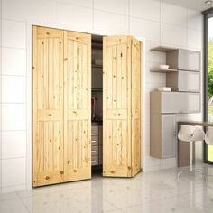 two wooden doors open in a white room