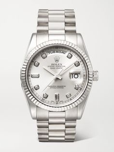 First commissioned in 1956, Rolex's 'Day-Date' earned the name of the 'Presidents' watch as an homage to the prestigious figures who have worn it. This 2002 watch from Stephanie Windsor's collection is crafted from 18-karat white gold and has a sunray brushed dial with both day and date windows. Brilliant- and baguette-cut diamond indices add a little sparkle. It comes in excellent condition. Anniversary White Gold Diamond Watch With Date Display, Elegant Watch With Day-date Display, Classic Formal Diamond Watch With Day-date Display, Classic Formal Watch With Day-date Display, Classic Formal Watches With Day-date Display, Classic Silver Watch With Day-date Display, Classic Diamond Watch With Day-date Display, Classic White Diamond Watch With Date Display, Timeless Formal Watches With Day-date Display