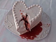 a heart shaped cake on a silver plate