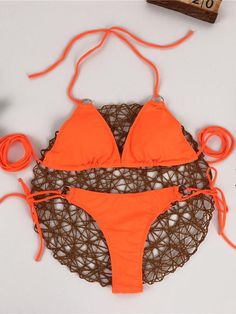 551684 Nylon Halter Neck Swimwear For Vacation, Orange Halter Neck Swimwear For Sunbathing, Orange Nylon Swimwear For Vacation, Orange Stretch Backless Swimwear, Orange Stretch Halter Neck Swimwear, Orange Nylon Swimwear, Summer Orange Nylon Swimwear, Orange Backless Swimwear For Beachwear, Orange Nylon Triangle Top Swimwear