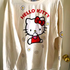 Hello Kitty Sweatshirt Size: M Color: Off White Brand New Without Tag White T-shirt With Cat Print For Fall, Hello Kitty Cotton Sweatshirt In Kawaii Style, Cute Cotton Sweatshirt With Hello Kitty Print, White Long Sleeve Sweatshirt With Cat Print, Long Sleeve Cotton Tops With Cat Print, Hello Kitty Print Crew Neck Cotton Sweatshirt, White Kawaii Sweatshirt With Graphic Print, Cotton Crew Neck Sweatshirt With Hello Kitty Print, White Cotton Kawaii Sweatshirt