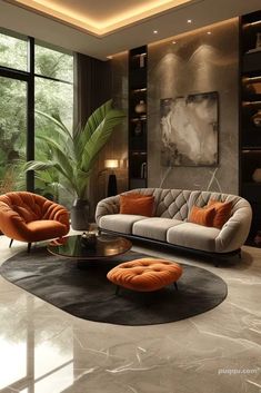 an elegant living room with orange and gray furniture